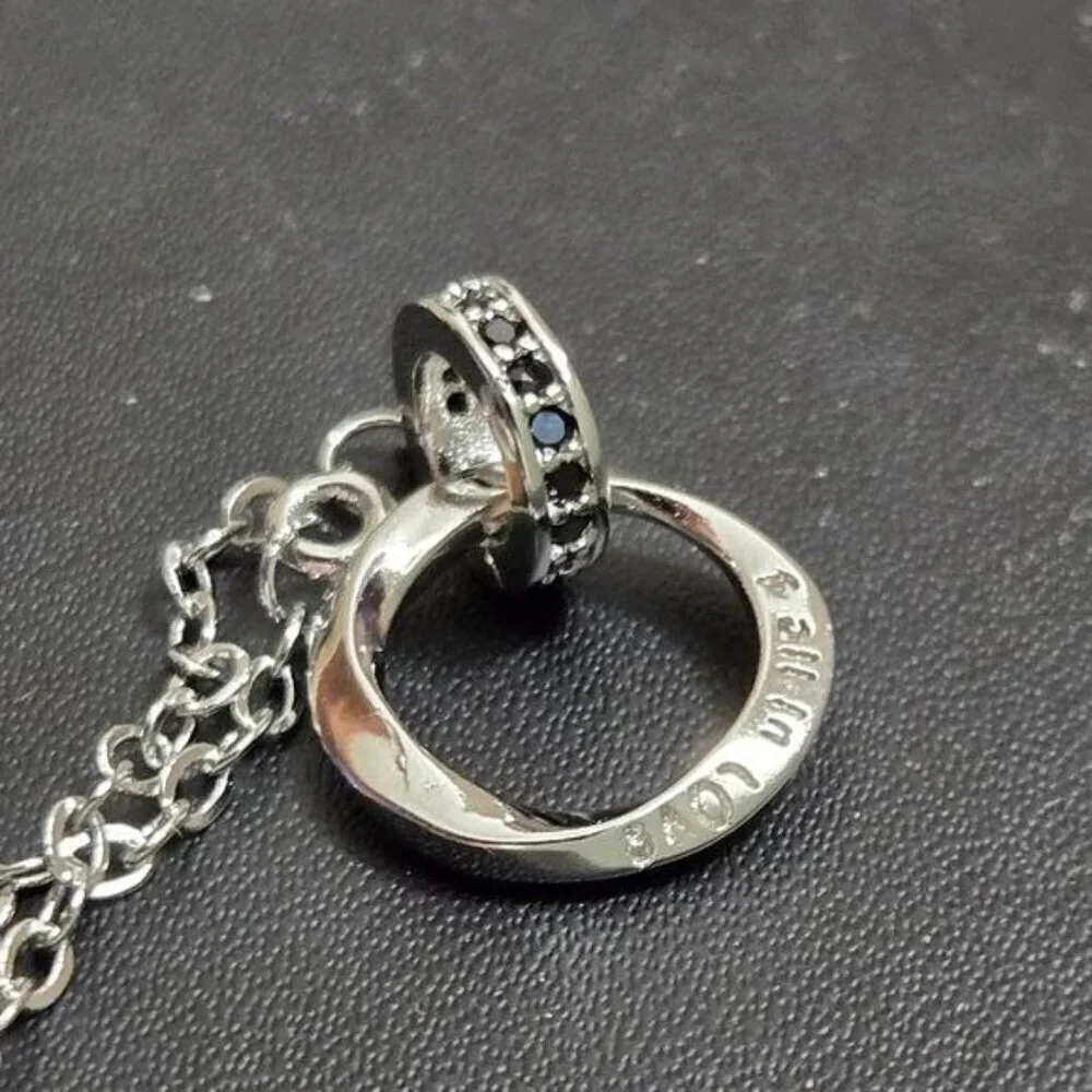 Interlocking Mobius Engraved Necklace in‎ Silver (NWOT)